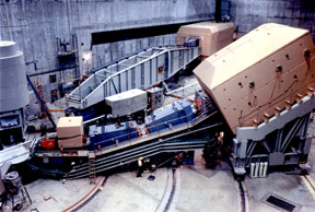 SPECTROMETER IN END STATION AT THE STANFORD LINEAR ACCELERATOR.
DOE'S STANDFORD LINEAR ACCELERATOR SCIENTISTS CONDUCT EXPERIMENTAL AND THEORETICAL RESEARCH IN HIGH ENERGY PHYSICS AND DEVELOPMENTAL STUDIES IN NEW TECHNIQUES FOR PARTICLE ACCELERATION. SLAC IS A NATIONAL BASIC RESEARCH LABORATORY, PROBING THE STURCTURE OF MATTER AT THE ATOMIC SCALE WITH X-RAYS AND AT MUCH SMALLER SCALES WITH ELECTRON POSITRON BEAMS. 
Keywords: Stanford Linear Accelerator Center (SLAC)