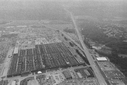 The Bendix Kansas City Plant
Manufactures non-nuclear parts for the bomb: integrated arming, fusing, locking, and firing systems; radars and power supplies; rubber, plastic, and foam products; and the bomb's outer casing. The plant employs 7,800 people. Kansas City, Missouri. July 17, 1982. 
Keywords: Bendix Kansas City Plant