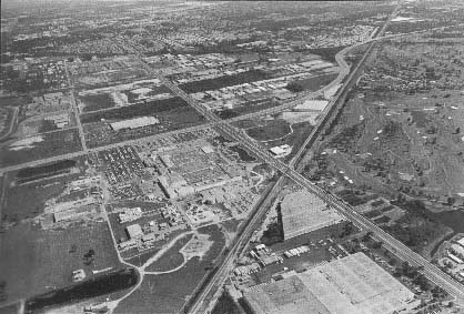 Pinellas Plant Largo, Florida
Pinellas manufactures thermal batteries, specialty capacitors, switches, and the fist-sized neutron generator used to initiate the fission chain reaction in a bomb. The plant employs 1,900 people and is sited at the intersection opposite the Bardmoor county Club golf course. Pinellas, Florida. October 19, 1986.
Keywords: Pinellas Plant Largo, Florida