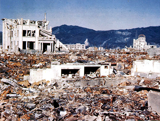 Hiroshima Gas Company Building
The foreground shows the ruins of the Hiroshima Gas Company Building (800 feet from the hypocenter). In the center are the ruins of the Honkawa Elementary School.
