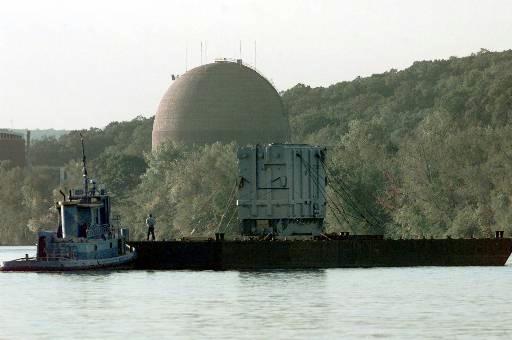 Connecticut Yankee Nuclear Power Plant (decommissioned)
A 300-ton electrical transformer, removed from the Connecticut Yankee nuclear power plant, is towed on the Connecticut River in Haddam Neck, Conn., Friday, Oct. 1, 1999. The transformer is to be shipped on the barge to North Carolina. The power plant, part of which is visible behind the barge, is in the process of being decommissioned. (AP Photo/Bob Child)
Keywords: Connecticut Yankee (Haddam Neck)