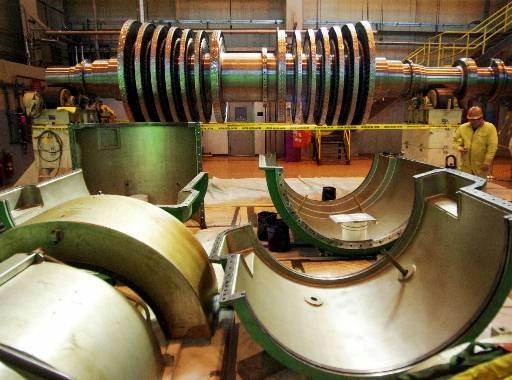 High speed turbine rotor at Perry nuclear power plant
A new high-speed turbine rotor, top, awaits installation at the Perry nuclear power plant in North Perry, Ohio, Wednesday, Feb. 28, 2001. Upgrading the steam turbine during this planned refueling shutdown, will increase the generating plant's output by 1,320 megawatts per hour.
Keywords: High speed turbine rotor at Perry nuclear power plant in North Perry, Ohio Perry Nuclear Power Plant