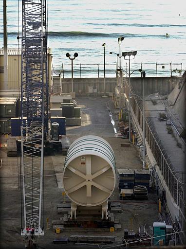 San Onofre Nuclear Generating Station
A steel and concrete tube holding a 668-ton defunct nuclear reactor sits in a secured holding area along the Pacific Ocean at Onofre near San Clemente, Calif. In a few weeks, the cargo will leave Southern California by barge for a voyage around the tip of South America en route to its final resting place in a disposal facility in South Carolina. Critics say Southern California Edison is taking a foolish gamble by sailing the radioactive material through one of the world's most dangerous nautical passages.
Keywords: San Onofre Nuclear Generating Station Power Plant SONGS near San Clemente, Calif.