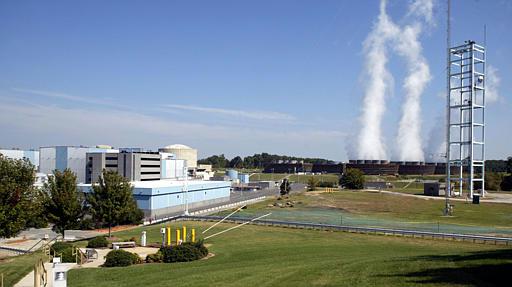 Catawba Nuclear Power Station
Steam rises from the cooling towers at Duke Catawba Nuclear Power Station near York, S.C., Monday, Oct. 11, 2004. The concrete moat under construction at the station south of Charlotte has little to do with the utility's plans to start burning mixed-oxide fuel containing small amounts of weapons-grade plutonium next spring. Designed to prevent everything from passenger cars to military tanks from getting too close to the reactor, the moat is part of a post-Sept 11, 2001 security upgrade.
Keywords: Catawba Nuclear Power Plant