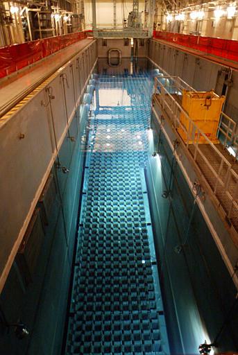 Catawba Nuclear Power Station
Duke Catawba Nuclear Power Station's spent fuel pool is seen at the nuclear plant near York, S.C., Monday, Oct. 11, 2004. Used uranium is cooled and stored in the pool. The concrete moat under construction at the station south of Charlotte has little to do with the utility's plans to start burning mixed-oxide fuel containing small amounts of weapons-grade plutonium next spring.
Keywords: Catawba Nuclear Power Plant