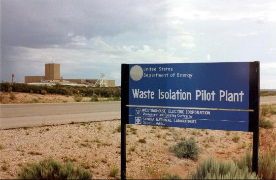 The Waste Isolation Pilot Plant (WIPP) is the first major nuclear waste disposal facility to be built in the United States, and so far also the only one. This Department of Energy (DOE) facility east of Carlsbad, New Mexico, is a final disposal site for government-generated radioactive waste, including material from nuclear weapons production. The Plant was constructed in the early 1980's and finally received the first load of waste in the late 1990's. Constructed at this facility is a mile long corridor 2,150 feet underground, off of which are several chambers for  waste storage. There are 30 or so support structures at the surface, in a secure zone covering over 10,000 acres.   All the waste disposed of at WIPP is from other DOE and military sites (none of it is commercial, high-level nuclear waste--that is slated for Yucca Mountain, Nevada), and is comprised of mostly irradiated laboratory material, such as gloves, protective clothing, and other disposable test equipment.
Keywords: Waste Isolation Pilot Plant (WIPP)