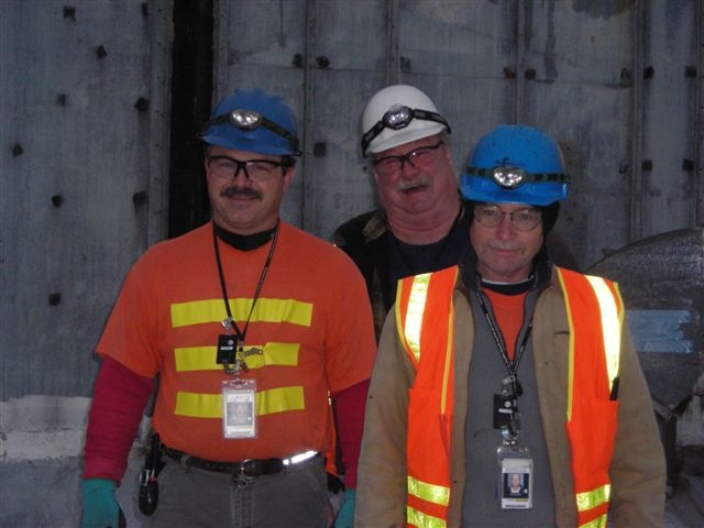 100N Demo 109N roof
Mark Martin, Kevin Thomas and Greg Collier take a moment from their work to get a quick pic.
