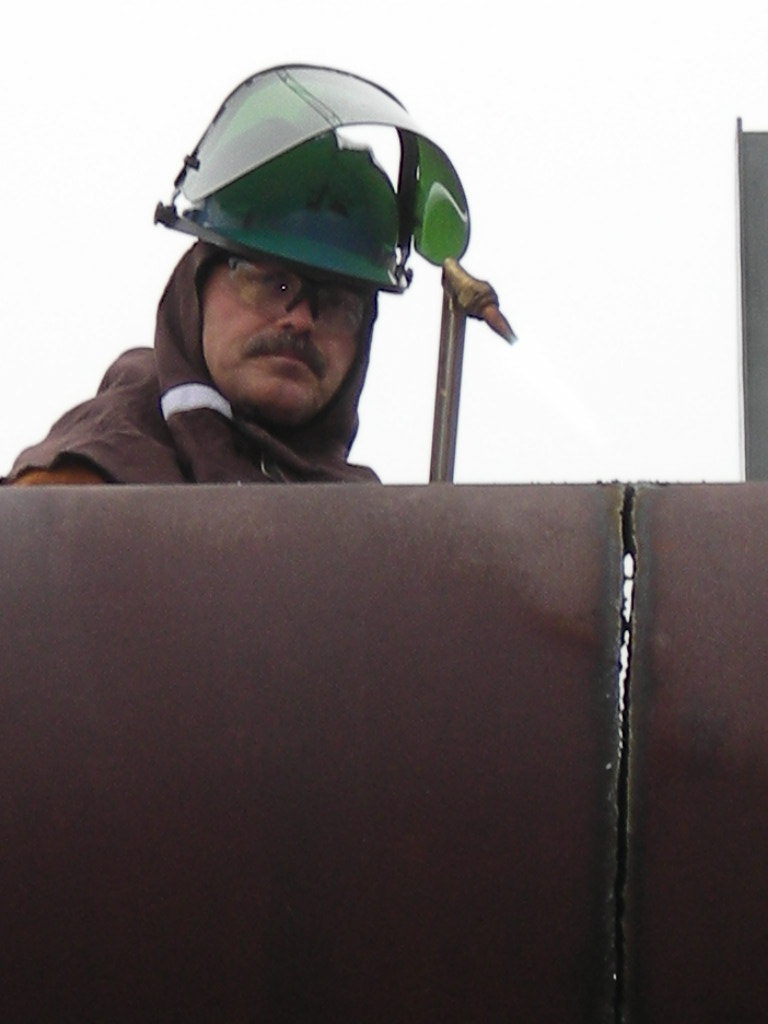 Cutting Steam Piping
Mark Martin finishes a cut on the roof of 109N during demo of the 100N reactor.
