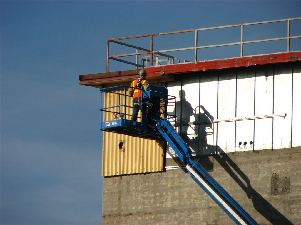 Mark Schaffer
Looking a bit closer as Mark removes siding
