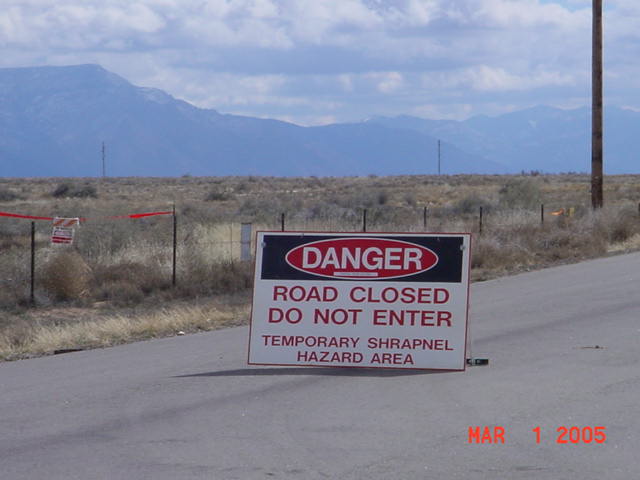 Shrapnell????
These occasionally pop up on site.  Its good if you see the printed side first I suppose.  This may or may not happen the way you would like!
Keywords: Sandia National Lab SNL