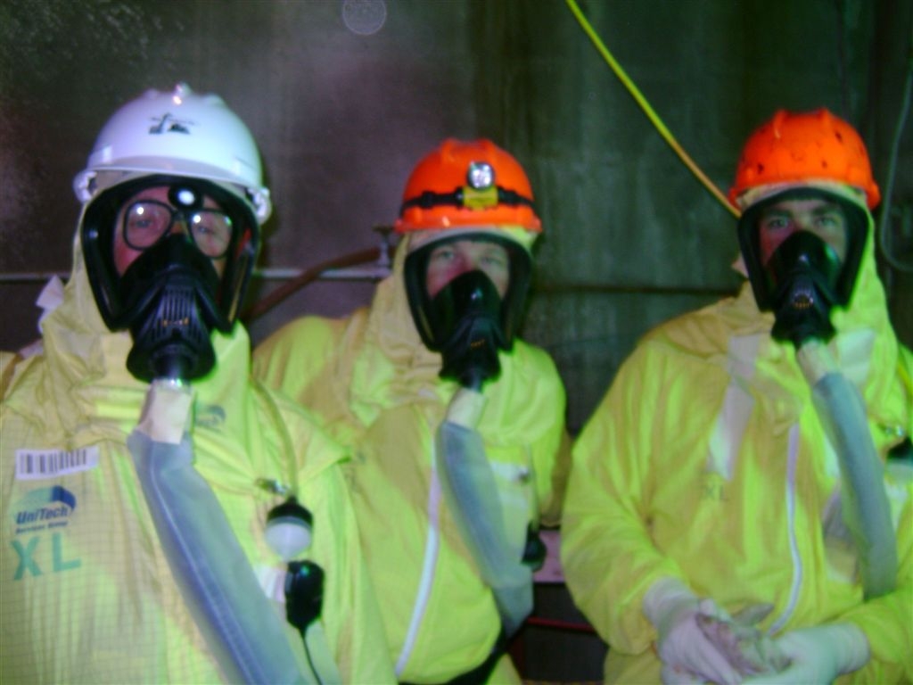 John Gessner, Dave Wells and Bryan Hills
In the 100N Lift Station, after we'd had multiple preventative barriers to ensure we didn't disturb the C-elevator drain, after we'd closed the station and de-mobilized..    We went back in to hot tap the C-elevator drain.
We don't know why we do these things..  we just do.
