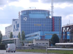 Khmelnitskiy plant blue building with white van
