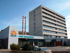 Paks office block with logo and chimneys