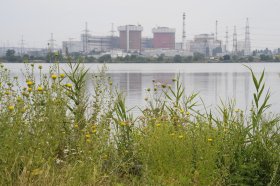 South Ukraine plant seen across water and reeds